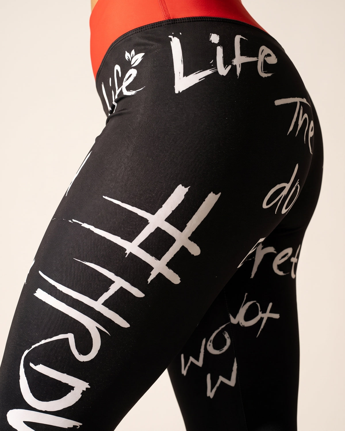 Slogan Cropped Leggings - Black - Hip Fabric Close-Up